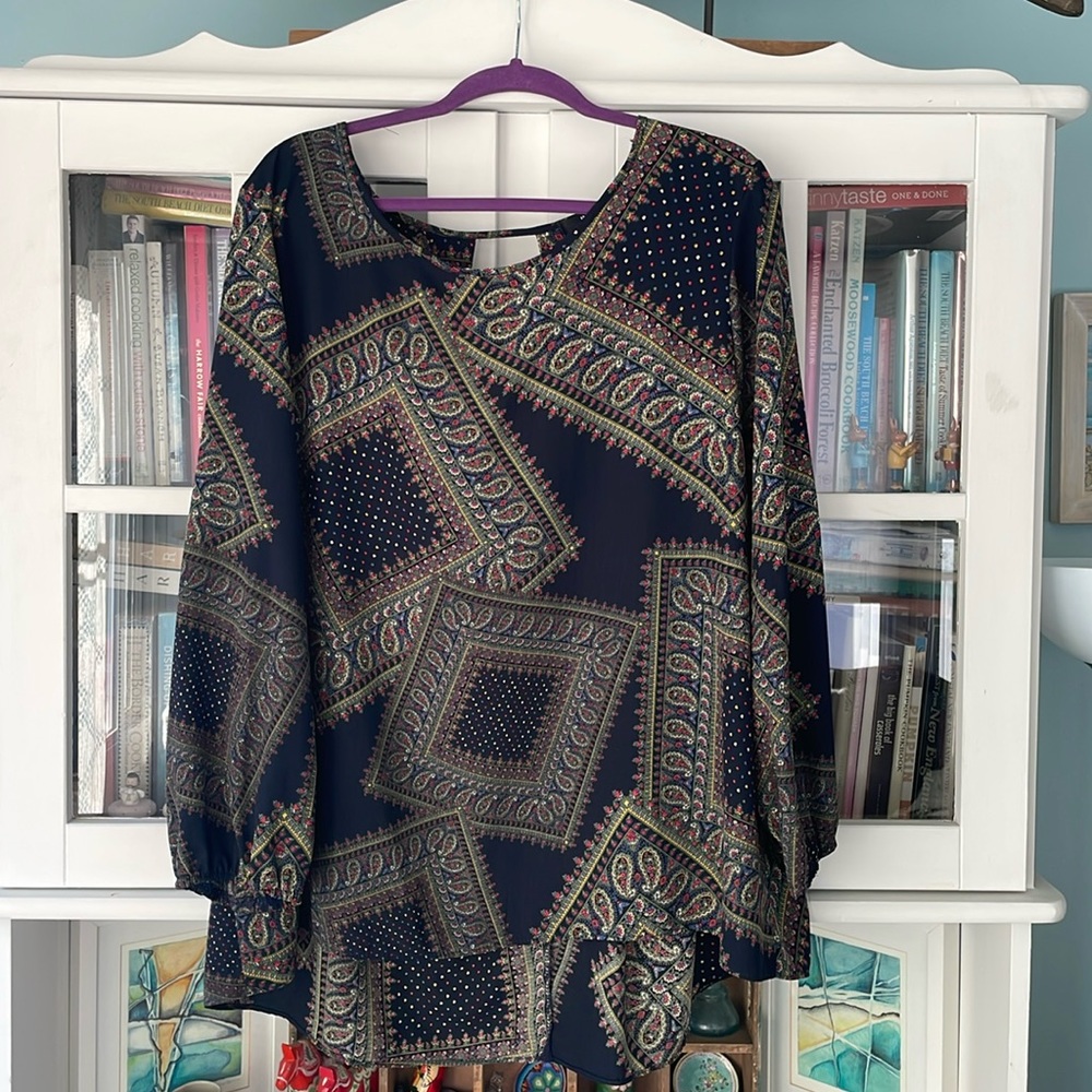 Blue patterned blouse with open notch back detail